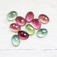 This rose-cut tourmaline parcel of 7x5 mm ovals are very lively. The natural untreated colors of mint green, sea foam bluish green, baby pink and hot pink are soothing and very pretty. These untreated Maine tourmalines are rare and sold as a 10 stone lot 