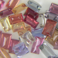 Multi color untreated sapphire in buff top baguettes. These Umba baguette sapphires are natural untreated sapphires and come in  various sizes and many earthy colors such as pastel pinks, rose sapphires, baby blue sapphires, peach sapphires, gray sap