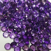 Exquisite and precisely cut purple amethyst gemstone melee, measuring 4 mm in rounds, are available in calibrated sizes. These sparkling round amethyst melee showcase a range of shades, varying from light to medium purple and medium dark. They are perfect