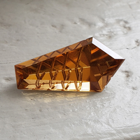 Super brilliant fancy golden cognac zircon.  This clean and very unique custom cut elongated pentagon natural untreated zircon has flashes of champagne and amber.  Very striking natural gemstone!