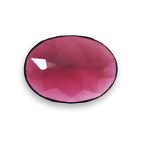 Large oval rose-cut pink tourmaline. This lively untreated cranberry pink tourmaline has plum raspberry tones. This flat bottom faceted top deep pinkish red tourmaline is well cut.