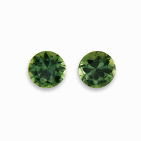 Matching pair of round green sapphires. This pair of 4.2mm moss green sapphires are clean and lively. Nice round  green sapphire pair as side stones for a ring or beautiful pair of green sapphire earrings!