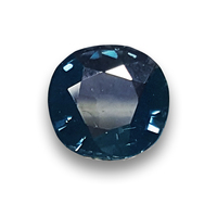 Rare cushion teal green color sapphire with flashes of plum and slight color change.  This deep blue green sapphire has characteristics and color attributes of an Alexandrite.  The shape of this unique green sapphire is a cushion but could also 