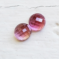 This parcel of two 6.5mm round rose cut pink tourmalines have a pretty pink color one is slightly lighter pink.These untreated Maine tourmalines  sold as a 2 stone lot 2.64 ct tw.