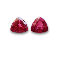 Matched pair of lively trillion red spinels with pomegranate pink undertones. Bright vibrant pair of triangle spinels. Great color saturation. 