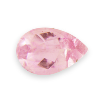 Perfect baby pink buff-top tourmaline.  This pear shape pink tourmaline from California is untreated and has a very low dome cabochon top and faceted bottom.  The could also be used as a rose cut pink tourmaline by setting it upside down.