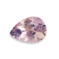 Rare Umba Sapphire with slight color change.  This pear shape sapphire in daylight is a light taupe smokey color and in fluorescent light becomes a pastel lavender color.  Very lively and pretty untreated sapphire from Africa.