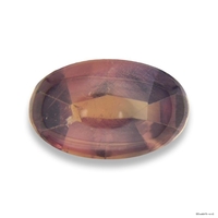 Natural untreated  color orange sapphire.  This oval buff-top sapphire is from the Umba River region of Africa and is very unique and with color saturation.