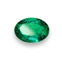 Lively oval Colombian emerald.  This emerald oval is very pretty and bright with flashes of sea foam green.