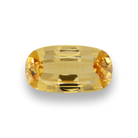 Lively unique oval yellow grossularite garnet.  This slightly elongated yellow garnet has a soft yellow color with a hint of peach almost reminiscent of a precious topaz color.  
