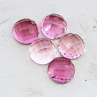 This parcel of five 5.5 mm round rose cut pink tourmalines range from baby pink to bubble gum pink. This untreated Maine tourmaline suite is  sold as a 5 stone lot 3.92 ct tw.