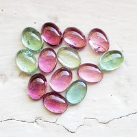 This tourmaline parcel of 7 x 5mm oval cabochons have an assortment of colors including baby pink, bubble gum pink mint green and sea foam blue green. These clean, rare and untreated Maine tourmalines are sold as a 13 stone lot 10.99 ct tw.