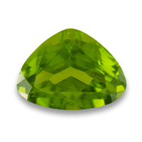 This nice bright triangular fat pear shape peridot is clean and lively.  This beautiful green Arizona peridot could also fall into the category of a large peridot trillion just waiting to be used in a custom design.