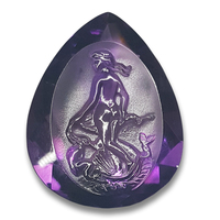 Huge cameo pear shaped natural amethyst carved with Venus Goddess. This absolutely rare and beautiful amethyst cameo with fully faceted bottom gives the precisely carved rear facing Venus life with light coming through. Carved in Idar Oberstein, Germany s