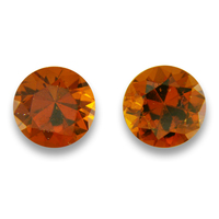 Super bright 7.5 mm round untreated brownish orange zircon pair.  This lively pair of zircons have a beautiful flashes of gold, copper and orange. Nice pair of zircon would make a perfect pair of zircon earring studs.