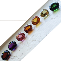 Behold our extraordinary large mixed gem suite, each precisely matched in size at 14mm x 16mm, making it a rare and exquisite find. This set showcases a collection of well-cut oval gemstones, each possessing exceptional clarity and brilliance.<br><br>Incl